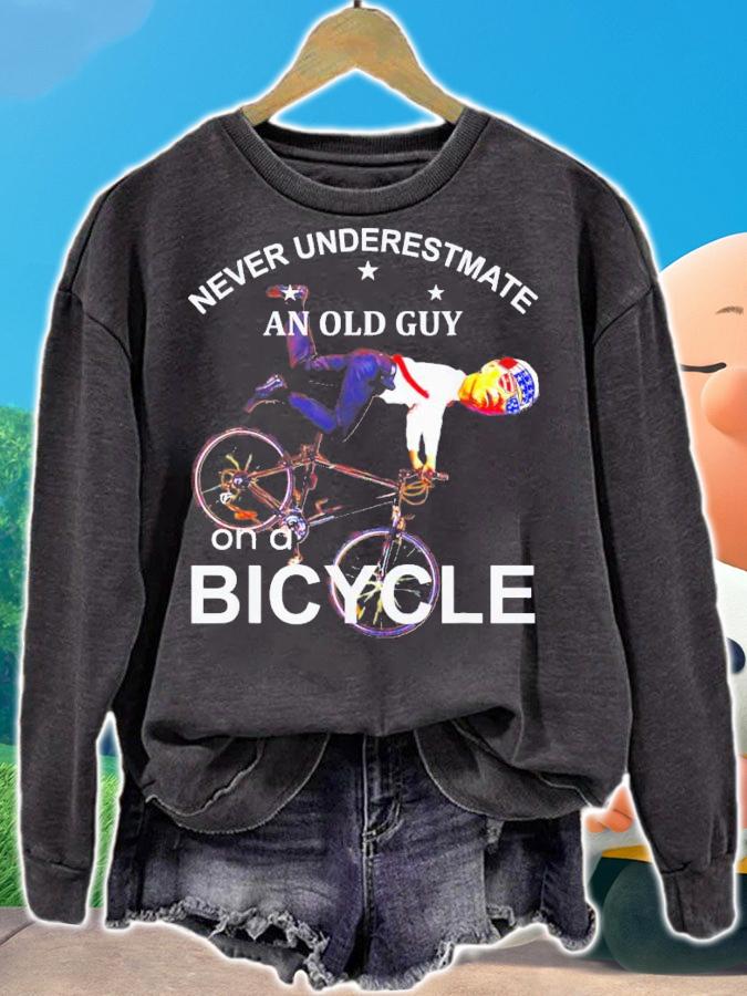 Joe Biden Bicycle Crash Never Underestimate An Old Guy On A Bicycle T-Shirt t-shirt sweatshirt